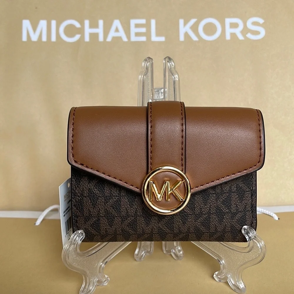 MICHAEL KORS CARMEN MEDIUM LOGO AND FAUX LEATHER WALLET BROWN
